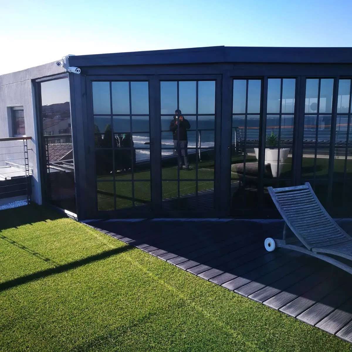 Rooftop glass enclosure sea view